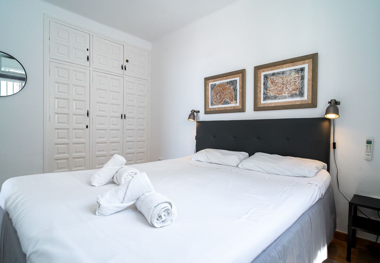 Cozy master bedroom with double bed at Los Naranjos 11B Capistrano Village.