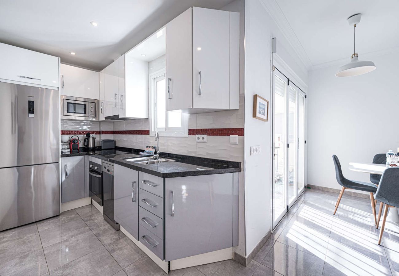 Fully equipped modern kitchen in Nerja holiday apartment.