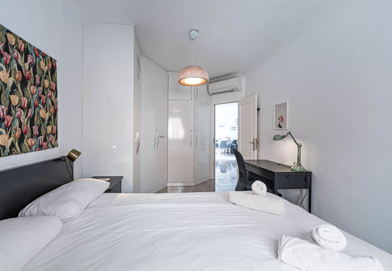 Double bedroom with workspace and high-speed Wi-Fi in Nerja rental.