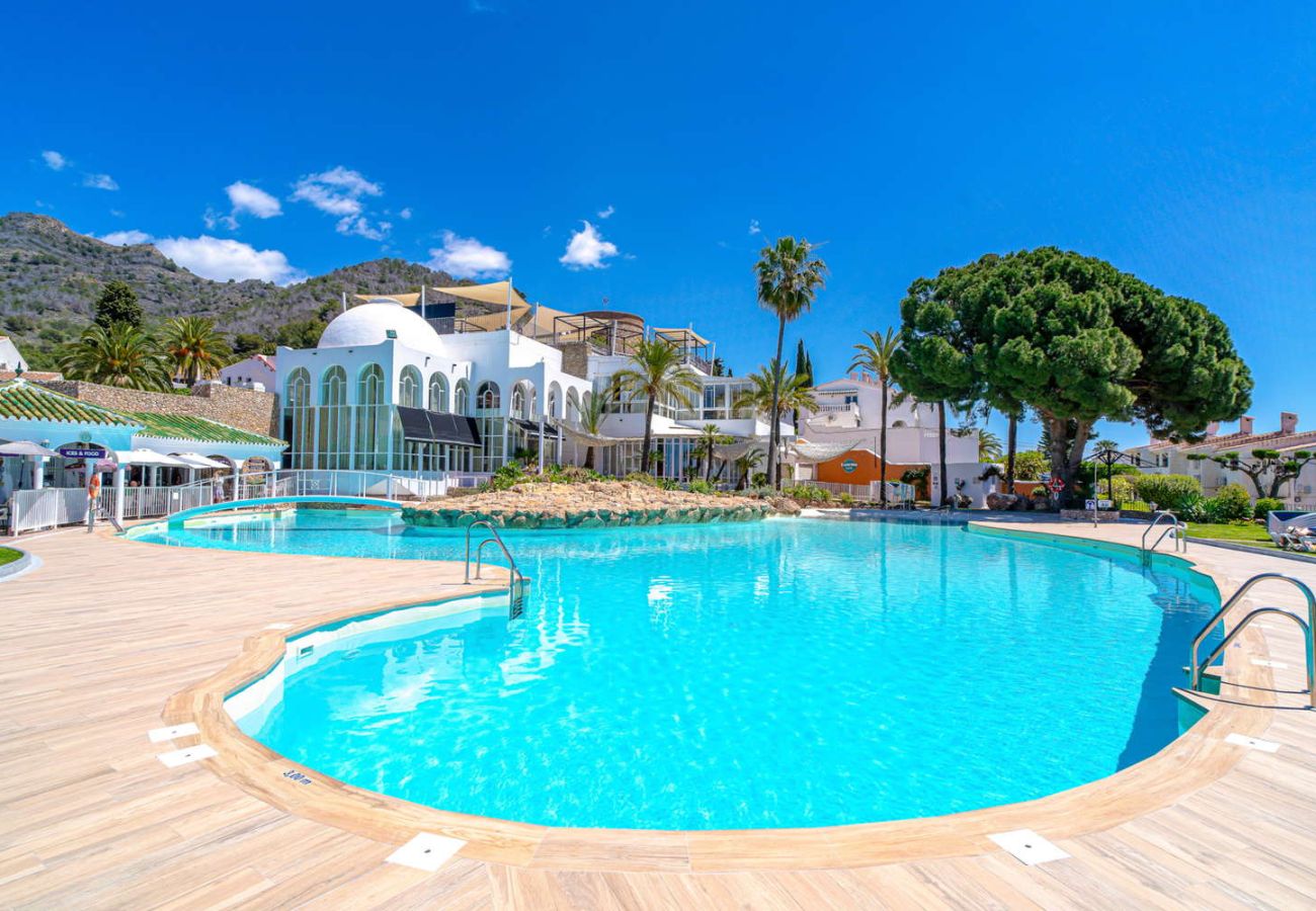 Large communal pool with children's area in San Juan de Capistrano, Nerja.