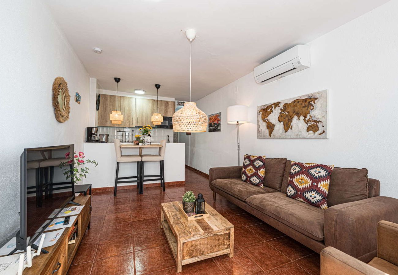 Modern and bright living room with stylish furniture in Arce 5 building.