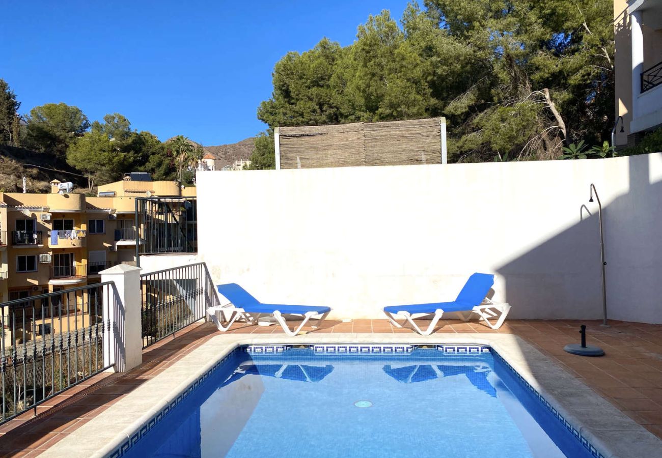 Sunbathing area with sun loungers for relaxing at Villa Lucena.