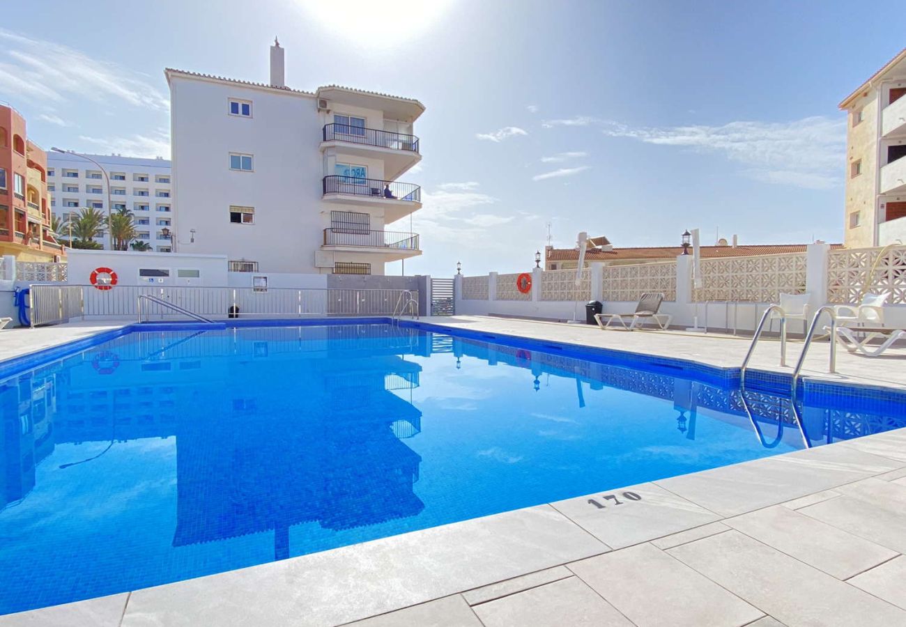 Communal swimming pool of the Arce Building located just a few metres from the beach in Nerja.