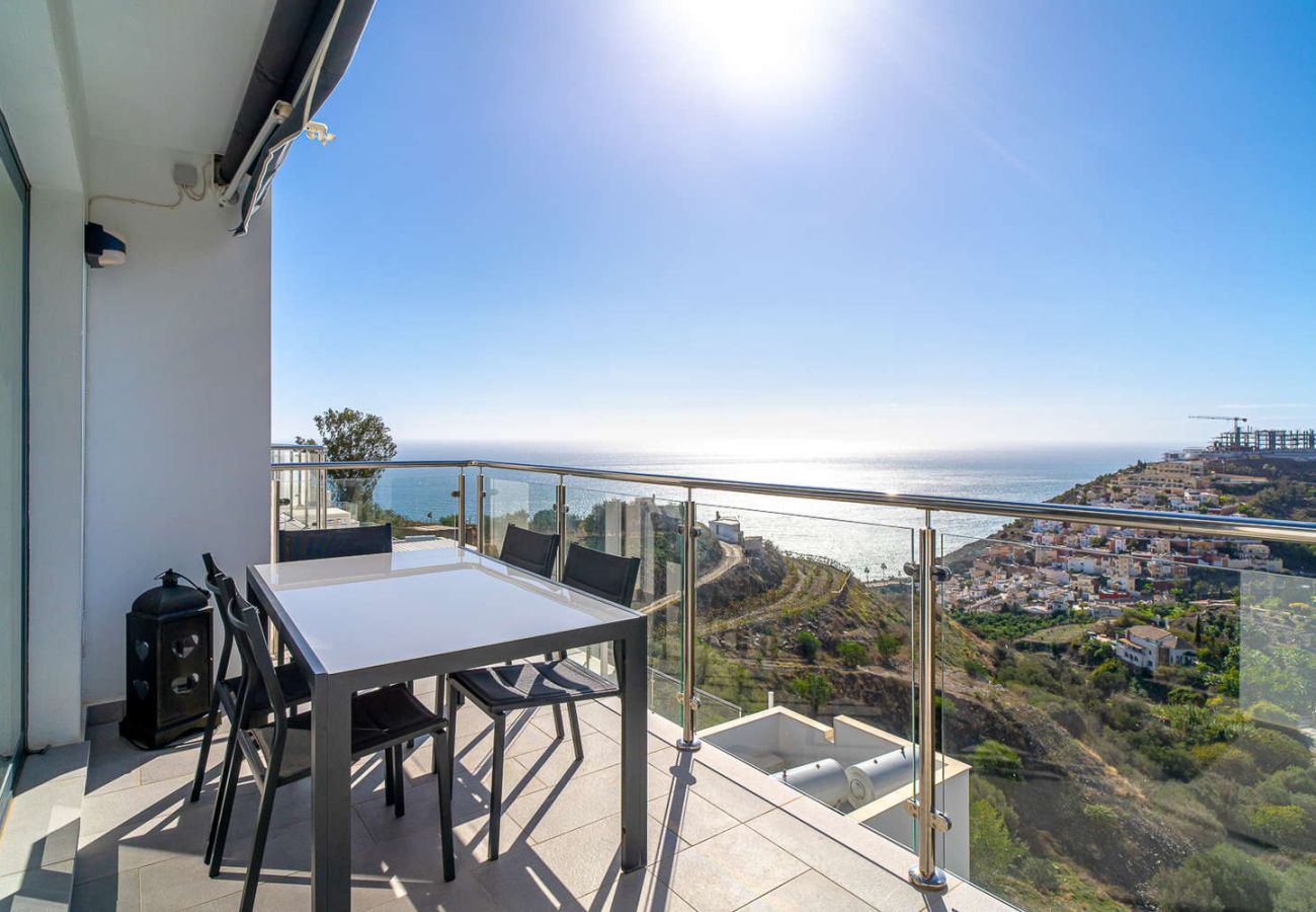 Private penthouse terrace in Nerja with panoramic Mediterranean Sea views and outdoor furniture in Balcón del Mar.