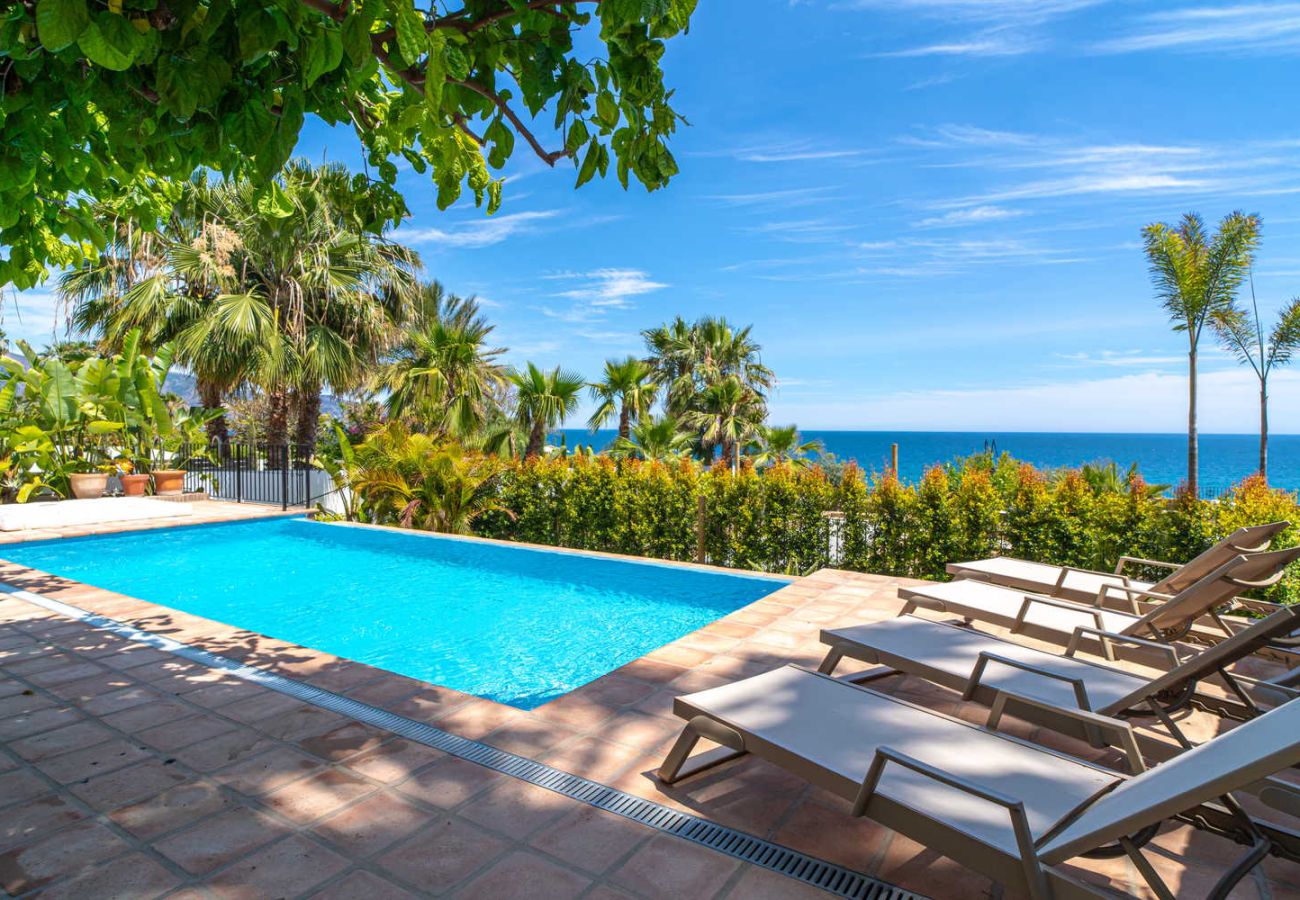 Private swimming pool on the seafront in Villa Lorca, Nerja.