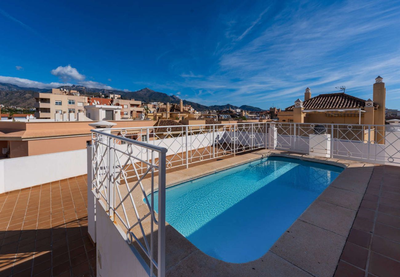 Communal rooftop swimming pool at Torrecilla Urban Beach Stay in Nerja, ideal for relaxation