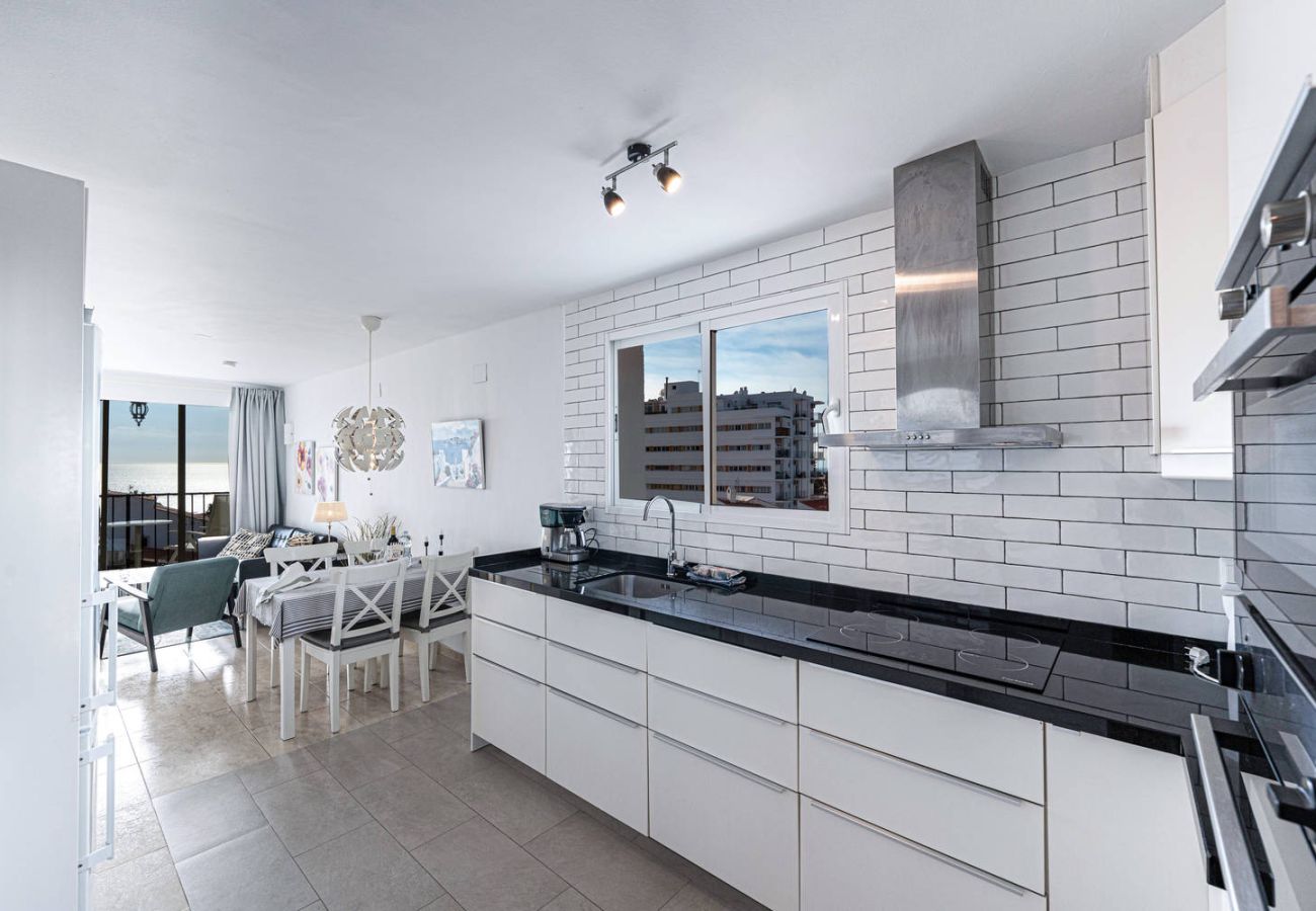 Spacious open-plan kitchen connected to living area