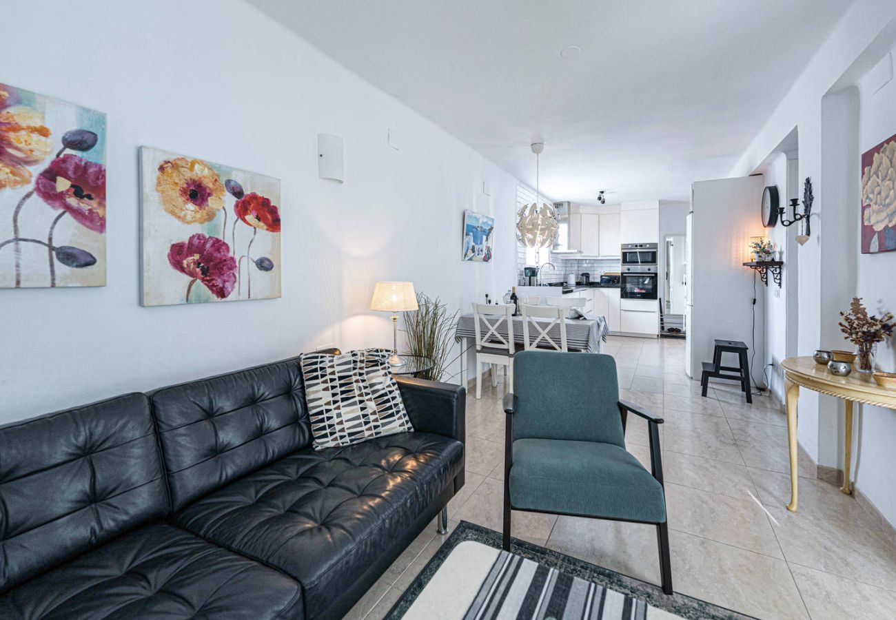 Bright and spacious living room in apartment in Nerja