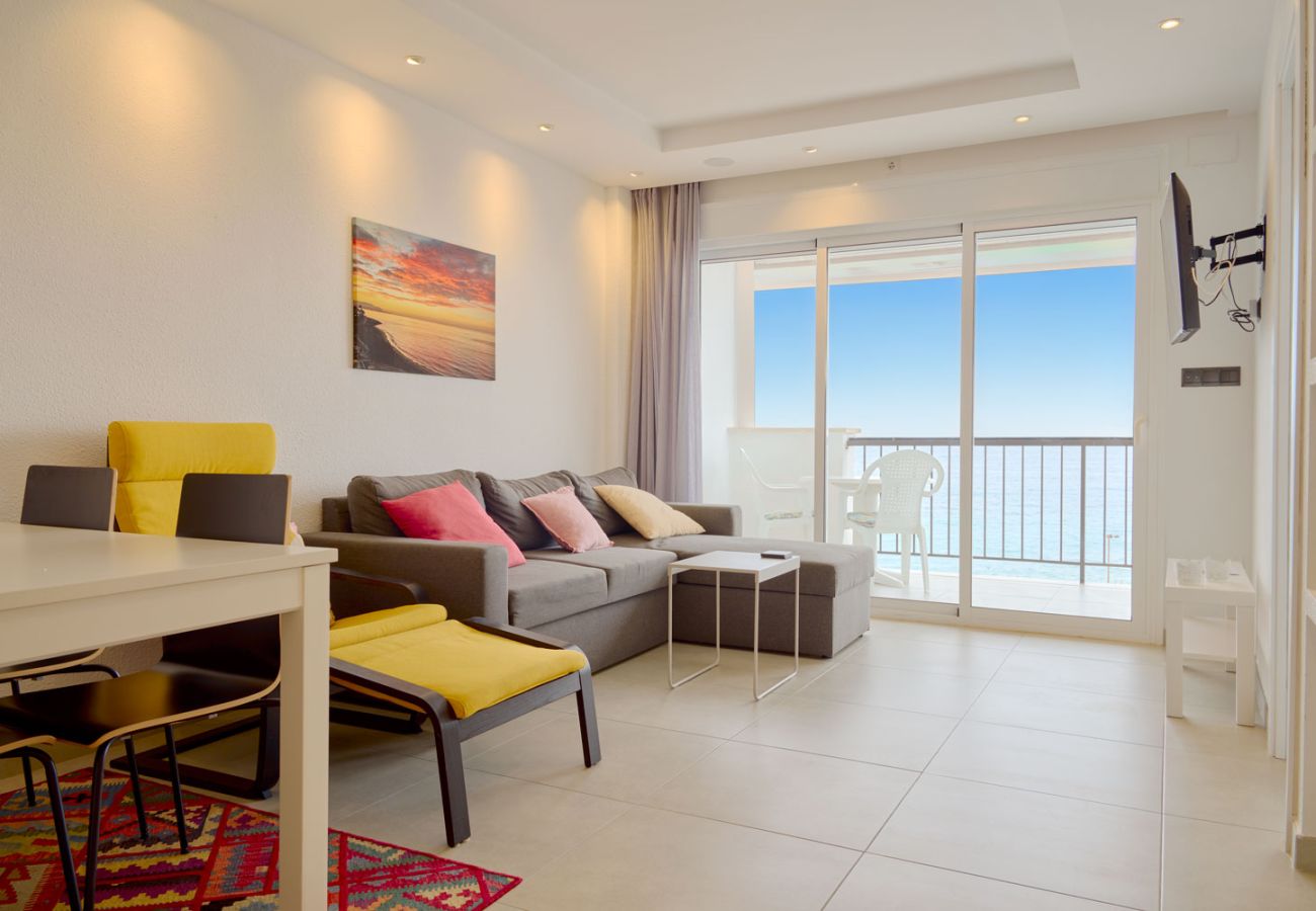 Living room with terrace access and total sea immersion in Nerja.