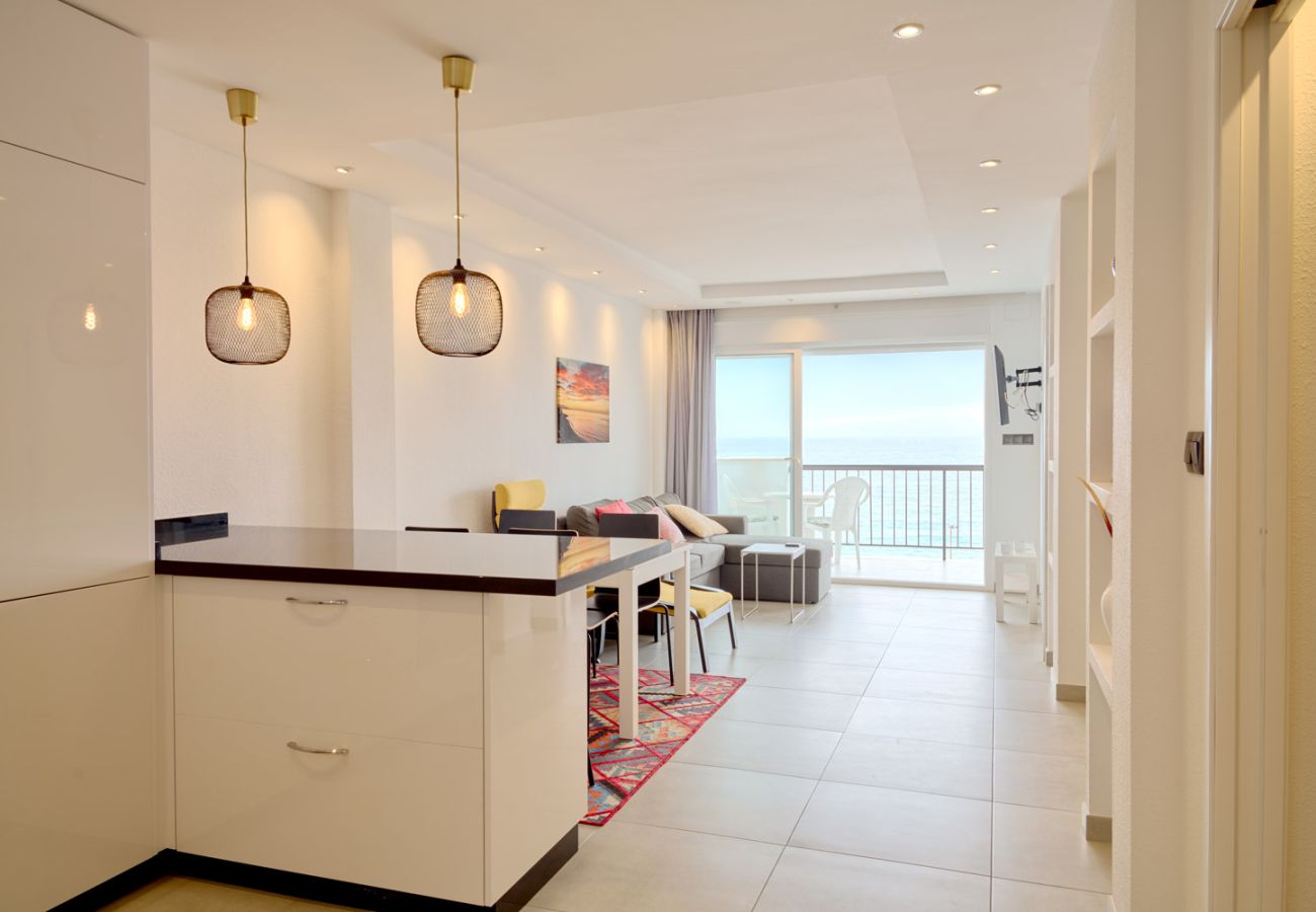 General view of the modern and bright living-dining room in Arce I 26 apartment, Nerja.
