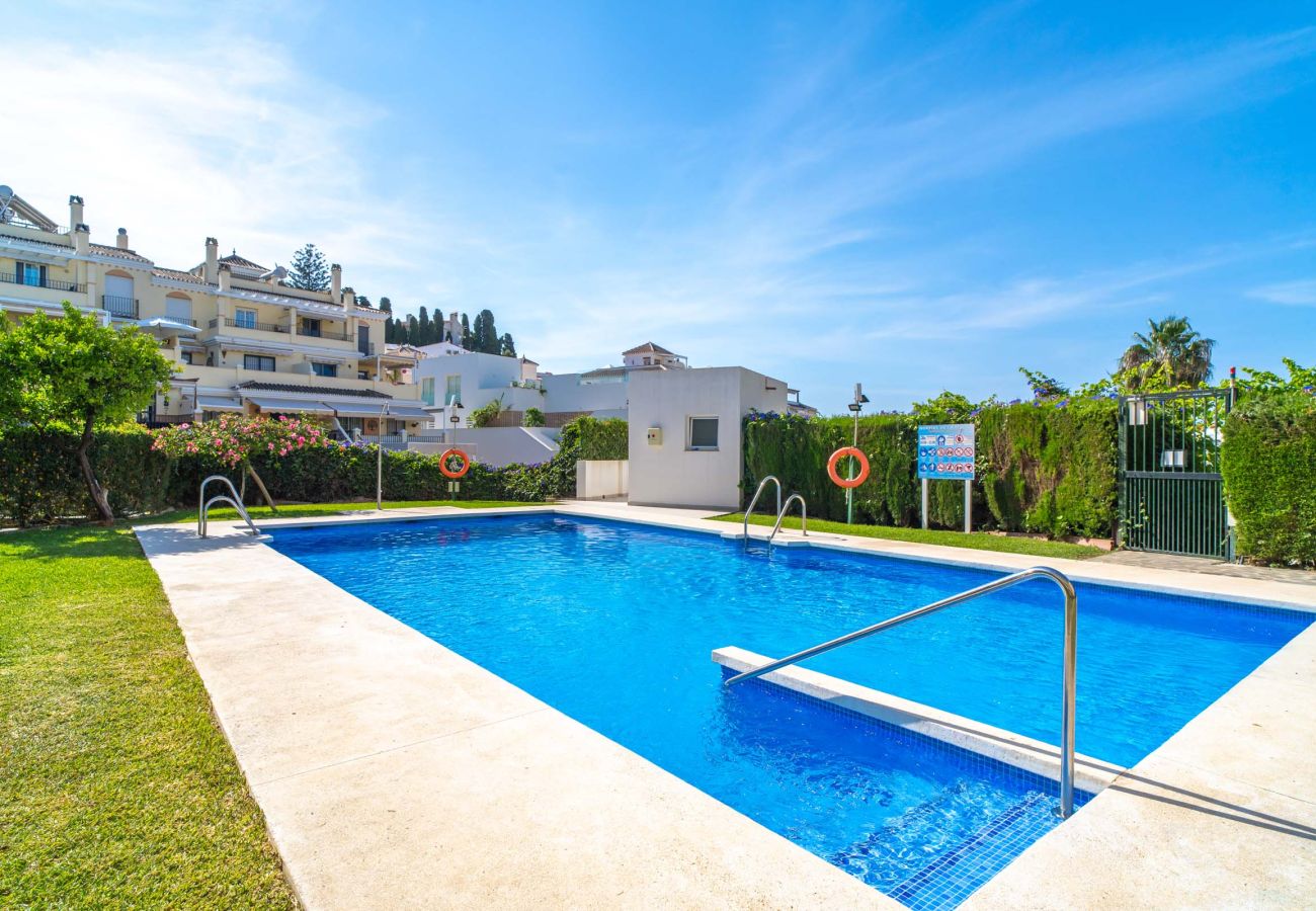 Communal swimming pool and shared areas at the Tahiti 2 7 residential complex.