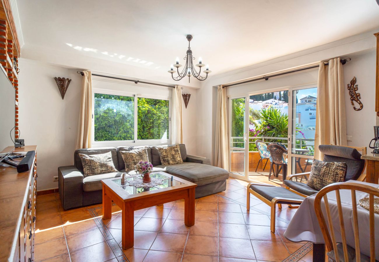 Spacious open-plan living and dining room in the Tahiti 2 7 apartment for 4 people with terrace access.