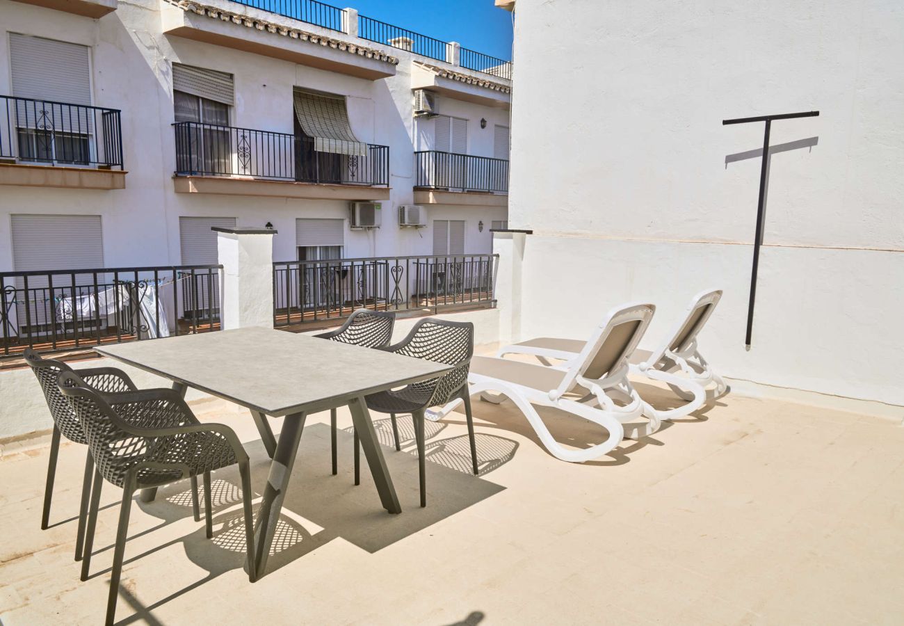 Radhus i Nerja - Casa Chica: Semesterhus med privat takterrass på Calle Cristo, Nerja